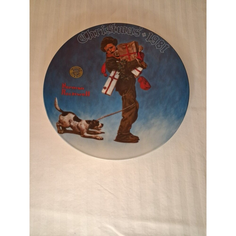 NORMAN ROCKWELL-WRAPPED UP IN CHRISTMAS 1981 KNOWLES PLATE COLLECTIBLE